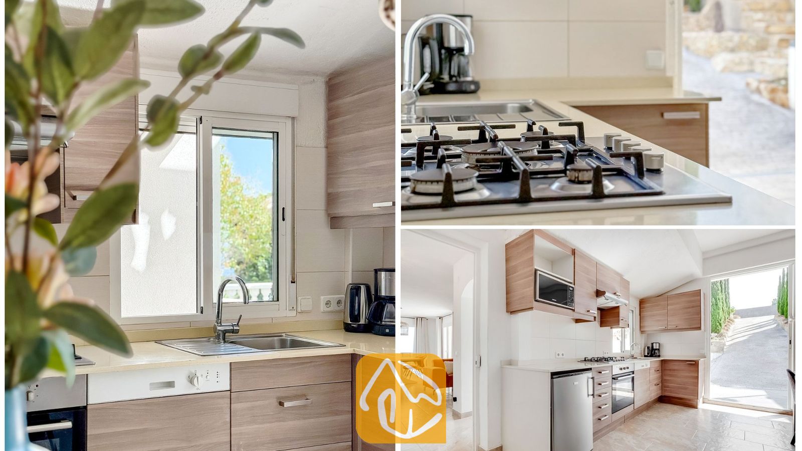 Cocina de Villa Tropicana equipada con gabinetes de madera, encimeras claras, estufa de gas y fregadero de acero inoxidable, iluminada por luz natural que entra a través de una ventana